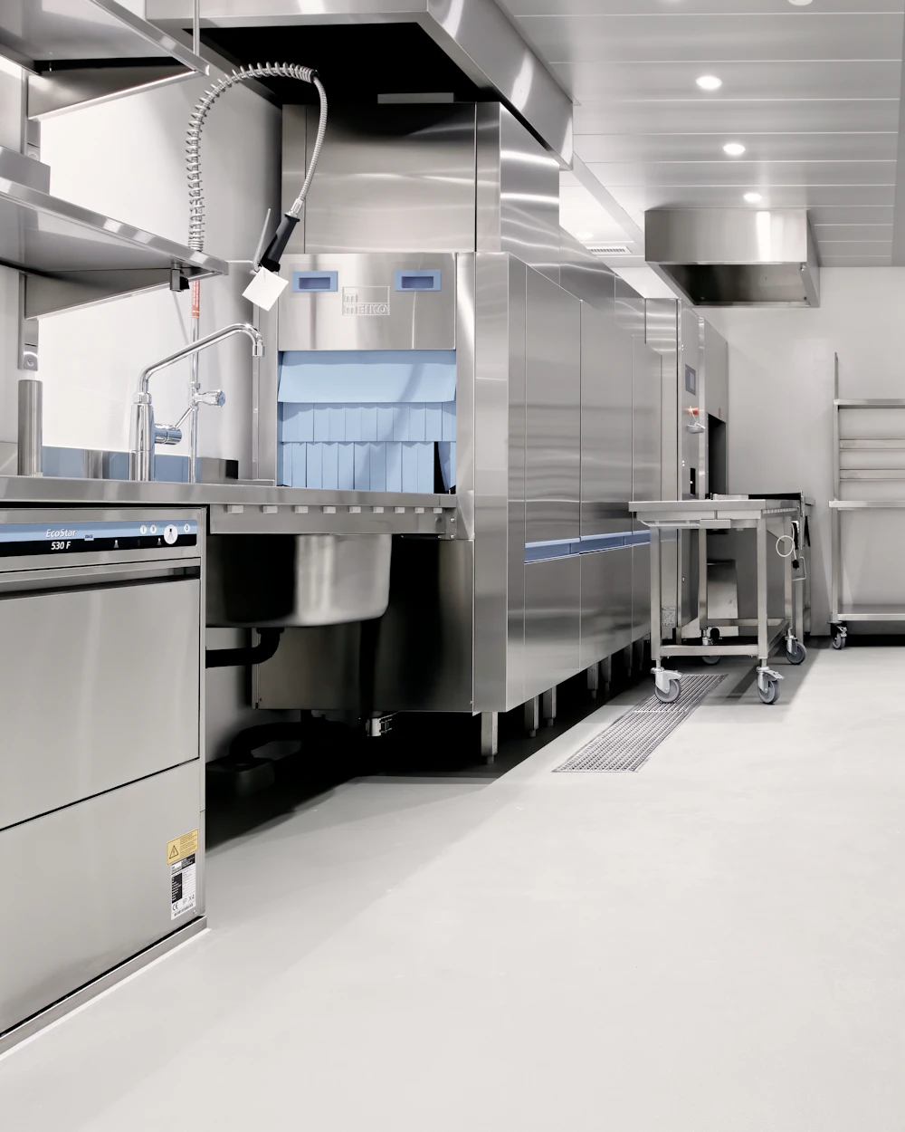 Commercial kitchen with stainless steel equipment