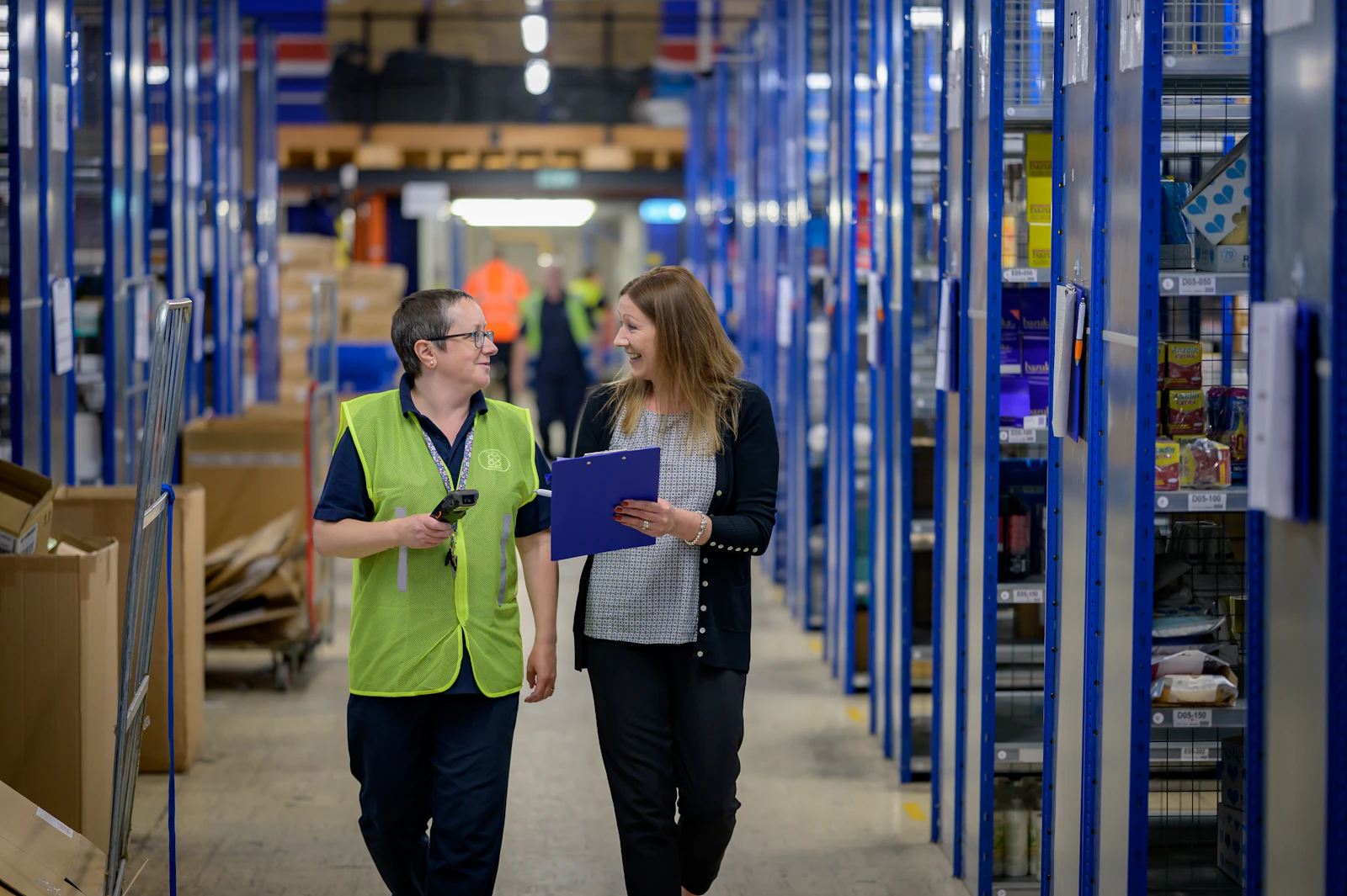 Team walking through a distribution warehouse